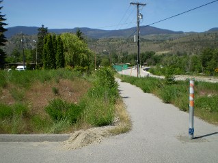 Path leading from parking to trail, Kettle Valley Railway Oliver to Osoyoos Lake, 2011-06.